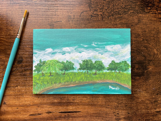 Front view of painting. Painting depicts a pond with cloudy sky, trees, and grass surround the pond